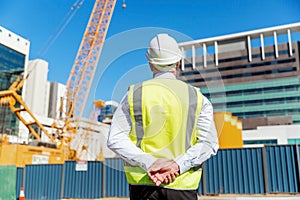 Engineer builder at construction site
