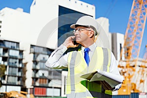 Engineer builder at construction site