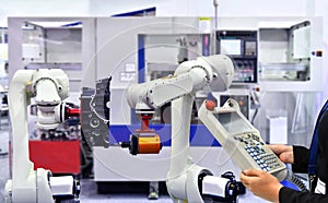 Engineer check and control automation Modern robotic machine vision system in factory