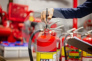 Engineer checking Industrial fire control system,Fire Alarm controller, Fire notifier, Anti fire.System ready In the event of a