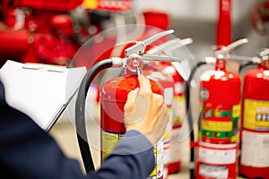 Engineer checking Industrial fire control system,Fire Alarm controller, Fire notifier, Anti fire.System ready In the event of a