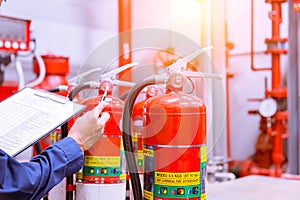 Engineer checking Industrial fire control system,Fire Alarm controller, Fire notifier, Anti fire.System ready In the event of a