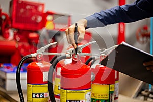 Engineer checking Industrial fire control system,Fire Alarm controller, Fire notifier, Anti fire.System ready In the event of a