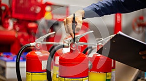 Engineer checking Industrial fire control system,Fire Alarm controller, Fire notifier, Anti fire.System ready In the event of a