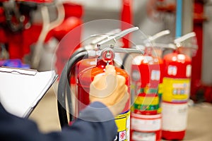 Engineer checking Industrial fire control system,Fire Alarm controller, Fire notifier, Anti fire.System ready In the event of a