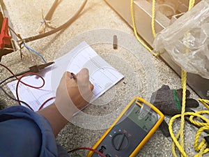 Engineer checking or inspection insulation resistance measuring for electric wire.