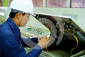 Engineer checking and repairing the electrical system