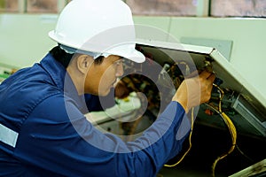 Engineer checking and repairing the electrical system