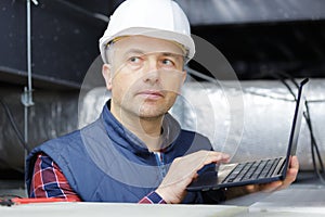 engineer checking solar panel