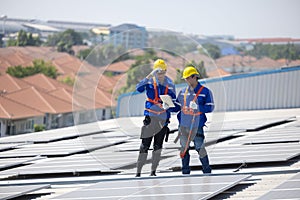 Engineer checking on solar panel on the rooftop