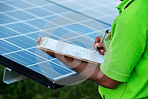 Engineer checking solar station