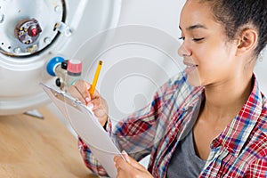 engineer checking temperature boiler