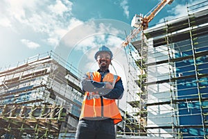 Engineer, construction and portrait of a black man at building site for development and architecture. Male contractor