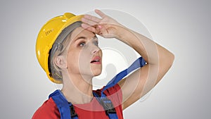 Engineer construction worker woman fascinated by the scale of co