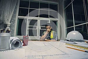 Engineer contractor serious hard working in office.