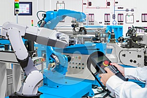 Engineer control automatic robotic at industrial