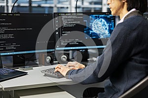 Engineer in data center optimizing hardware for artificial intelligence tasks