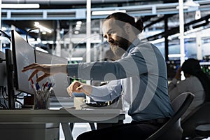 Engineer in data center using PC to update storage arrays software