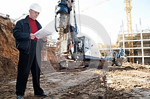 Engineer with documentation at