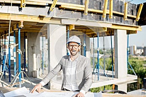 Engineer with drawings on the structure