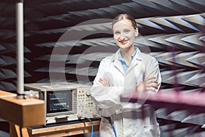 Engineer in electronics lab performing rf compliance test