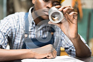 Engineer examining bushing