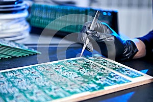 Engineer factory worker electronics works with a chip board. Microchip Production, Nano computer Technology and manufacturing