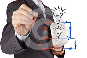 Engineer hand draws electrical diagram