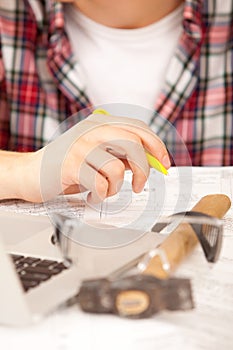 Engineer hands with pen