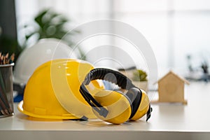 Engineer hat and foreman hat Placed on the desk, the concept of work, labor