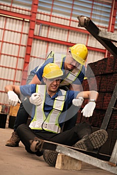 Engineer help anoter engineer, He has accident on the work in factory photo