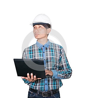 Engineer while holding using Laptop and head wear white safety helmet plastic.Concept Work construction on white background
