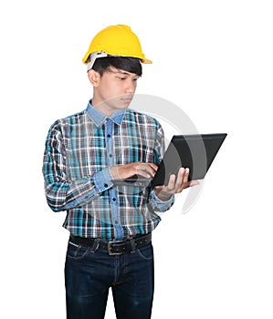 Engineer while holding using Laptop and head wear yellow safety helmet plastic . Concept Work construction on white background