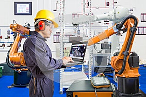 Engineer install and testing industry robotic in manufacturing photo