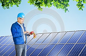 Engineer installing solar panels