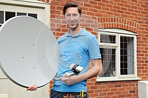 Engineer Installing TV Satellite Dish