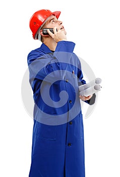 Engineer looking up while talking on the phone