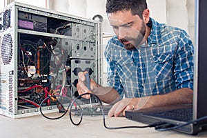 Engineer maintains a computer photo