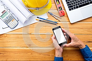 Engineer man hands holding blank screen a smartphone