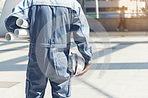 Engineer man hands holding hardhat white work helmet hard hat for Construction Engineering. Construction engineer man in safety