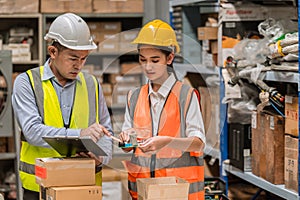 Engineer manager training new young women worker technician woman checking hardware device in factory