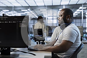 Engineer managing and optimizing data center infrastructure