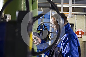 Engineer measuring noise levels photo