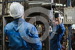 Engineer men wearing uniform safety in factory.