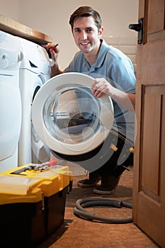 Engineer Mending Domestic Washing Machine