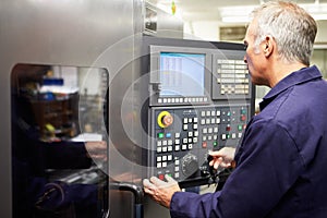 Engineer Operating Computer Controlled Lathe