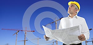 Engineer plan construction cranes blue sky