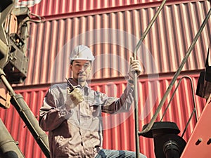 Engineer is pointing controlling the job at the Container cargo