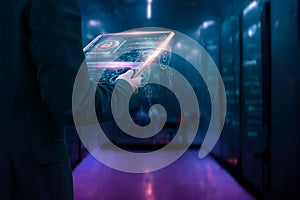 Engineer programmer futuristic in server database network information room,diagnostics and maintenance system,data center server