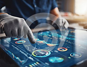 Engineer in protective gloves interacting with holographic interface